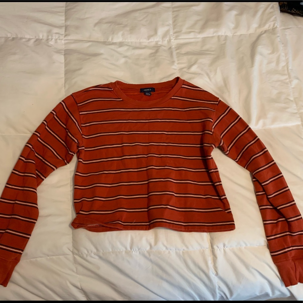 Cropped rust colored sweatshirt